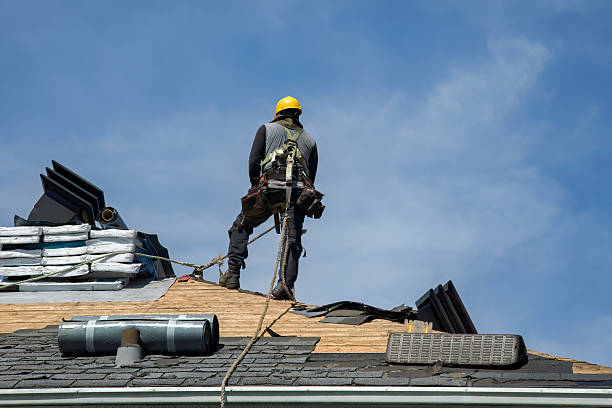 Professional Roof Replacement technician working in Preble, IN